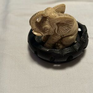 Vintage mini elephant on stand